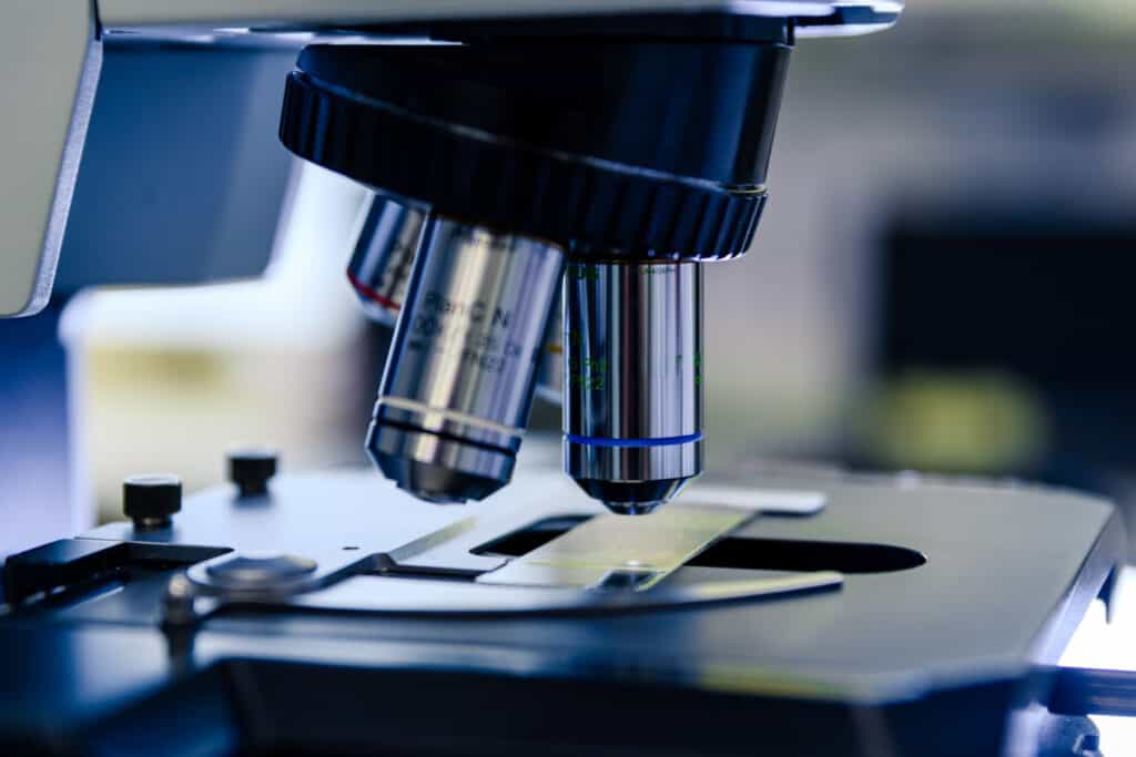 Closeup Shot Laboratory Microscope Lens Conducting Coronavirus Research (1)